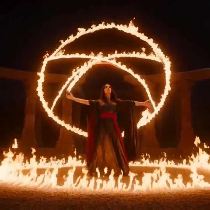 Seedance 2.0 Prompt: Cinematic Fire Dancer in Abandoned Courtyard