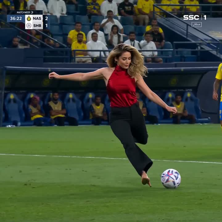 Seedance 2.0 Prompt: Glamorous Woman Scores Goal in Live Sports Broadcast