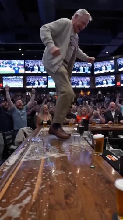 Seedance 2.0 Prompt: Packed Sports Bar Phone Camera Aesthetic