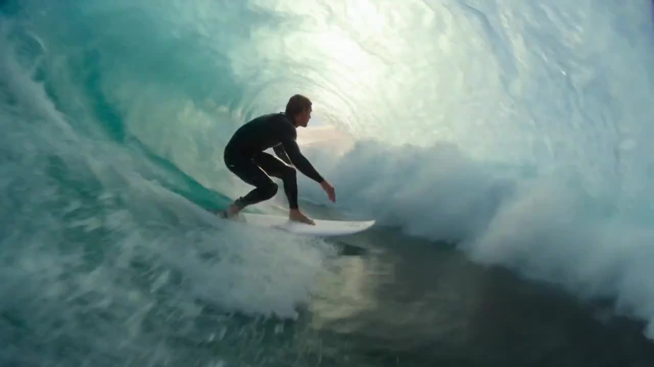 Seedance 2.0 Prompt: Surfer on Emerald Wave in 8K