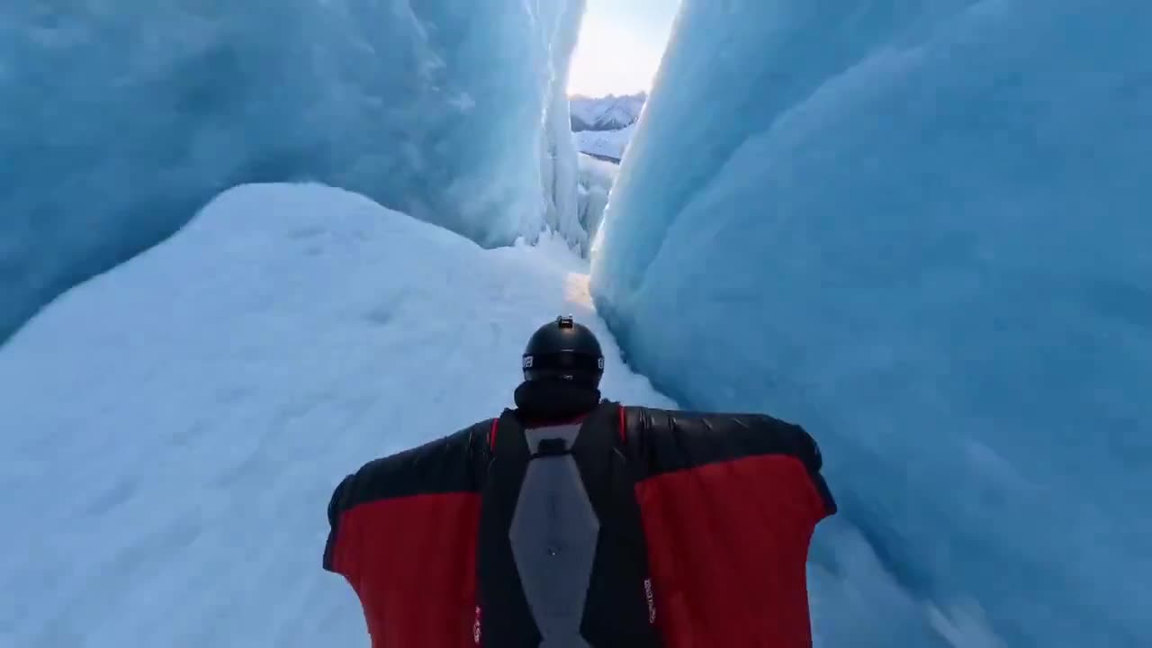 Seedance 2.0 Prompt: Cinematic Wingsuit Flight Over Snowy Mountains
